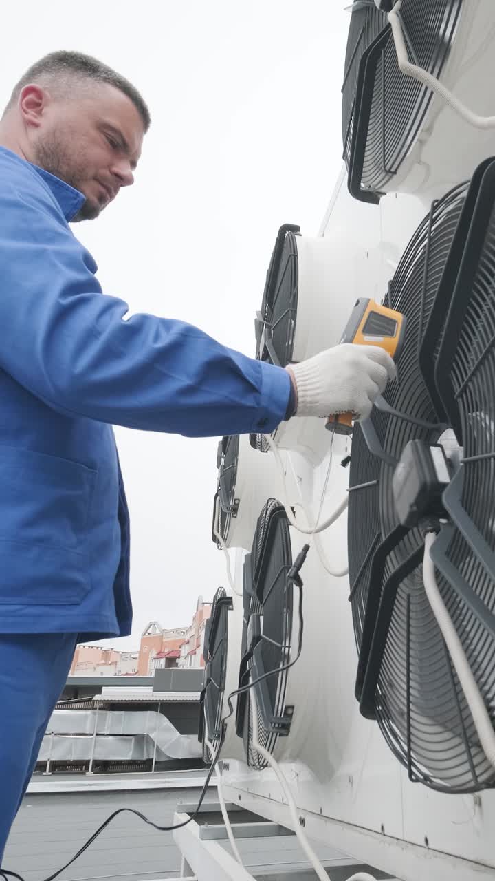 HVAC Technician Inspecting Cooling System