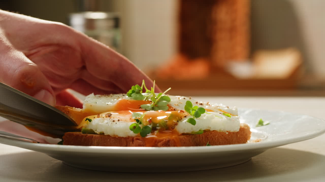 Preparing Avocado Toast with Poached Egg