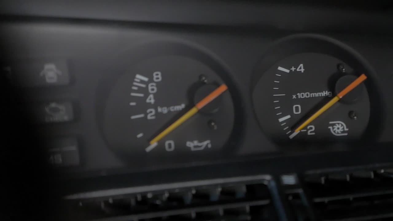 Showcasing a vehicles boost and oil pressure gauges.