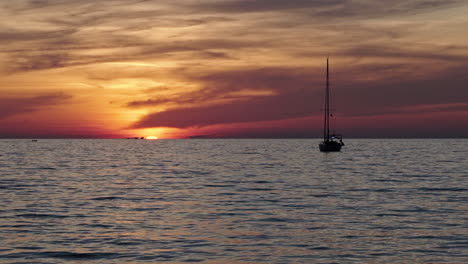 beautiful sunset as if the sky is burning where you can see the reflections of the burning sky over the sea