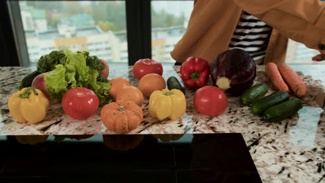 man packing vegetables