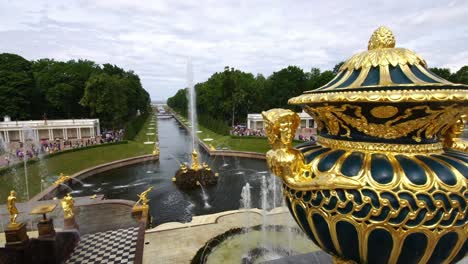 tracking shot showing fountains and vase at the grand palace park peterhof, saint petersburg, russia