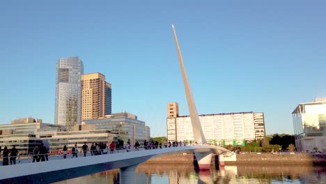 cityscape of puerto madero buenos aires city women's bridge argentina at sunset