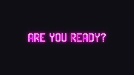 a flickering neon videogame message appearing on the screen: are you ready