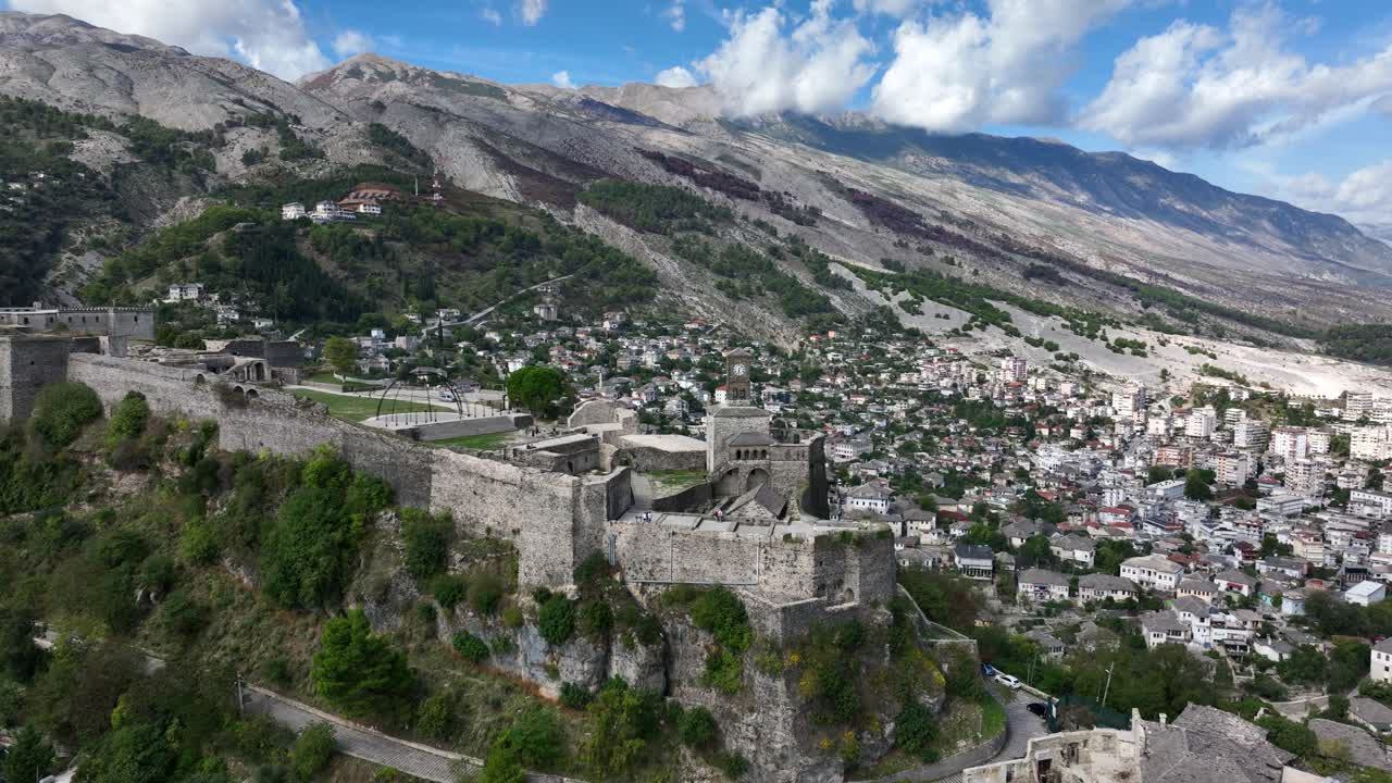 Imposing Fortress Overlooking Cityscape In Gjirokastra, Albania. Aerial Drone Shot