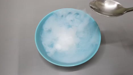 dry ice sublimates in water creating foggy effect