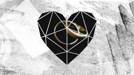 dos anillos vinculados a través de un primer plano en forma de corazón blanco