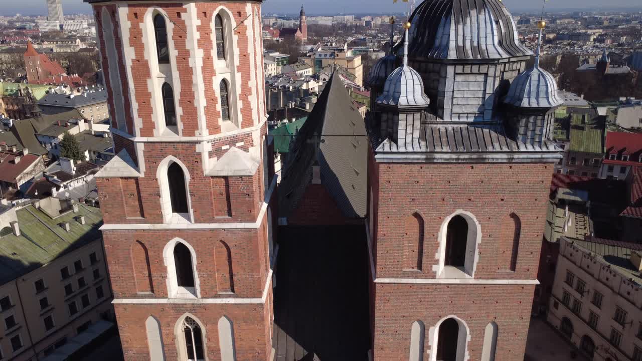 Aerial View Revealing St. Mary's Basilica Towers and Krakow Cityscape