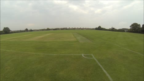 a fast view along an empty sports field in england, united kingdom