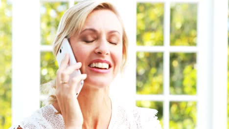 Happy-beautiful-woman-talking-on-mobile-phone