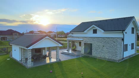 Modern-smart-house-with-two-buildings-units-at-sunrise,-residential-safe-neighborhood