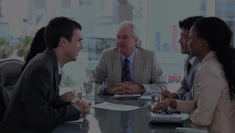 animation of financial data processing over diverse businesspeople high fiving each other at office