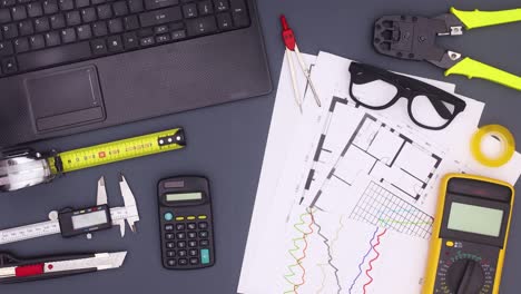 architecture and business table with plans and tools stop motion