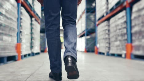 legs, walking and engineer man in warehouse