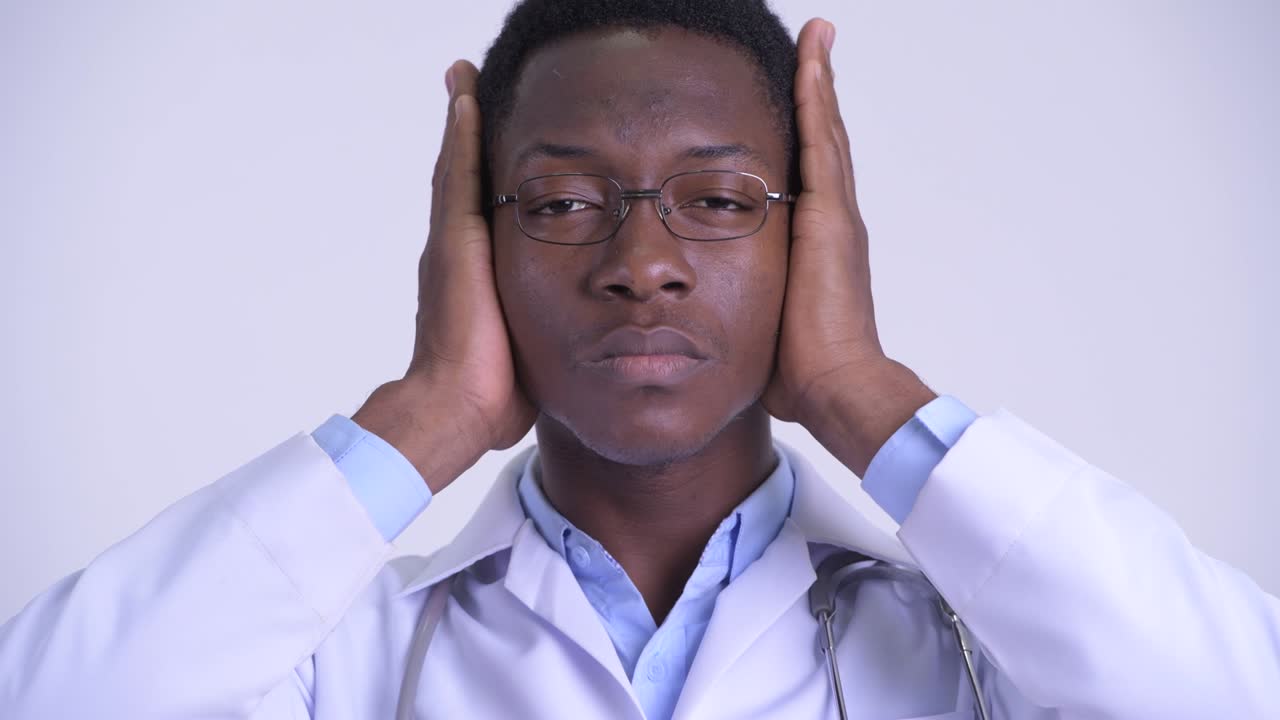 Young handsome African man doctor