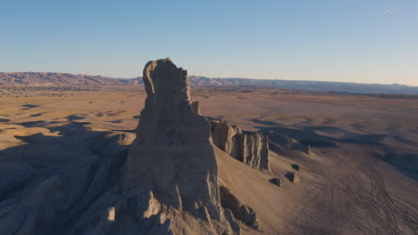 aerial view of badlands with a beautiful clear blue sky in utah, drone