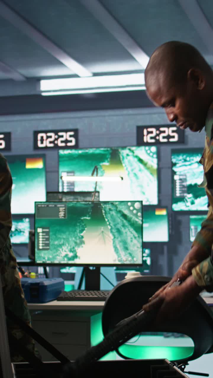 Vertical video Military officers working together to check guns in command post