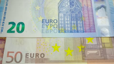 euro paper currency banknotes zooming in slowly.