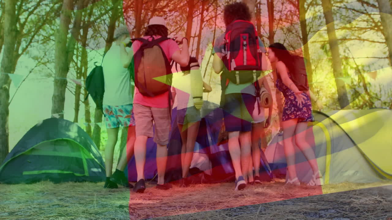 Group of friends with backpacks hugging in forest over colorful flag animation