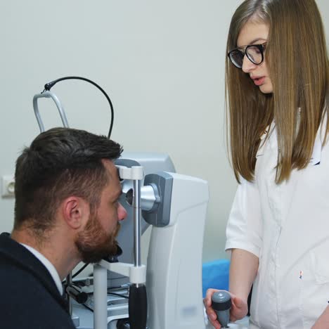 special equipment in ophthalmology clinic for vision correction. special corrective technologically up to date equipment. man`s portrait in clinic