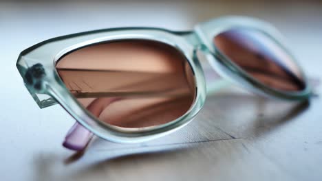 rack focus of cat-eye sunglasses on display