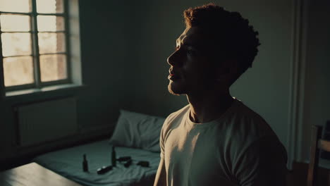 a young man in a room