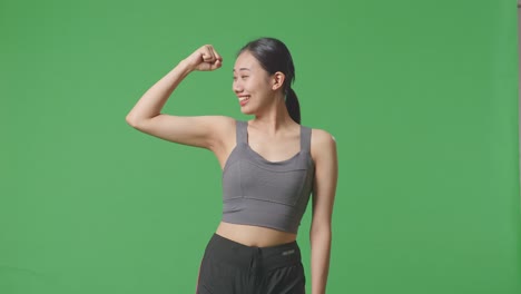 woman celebrating fitness success