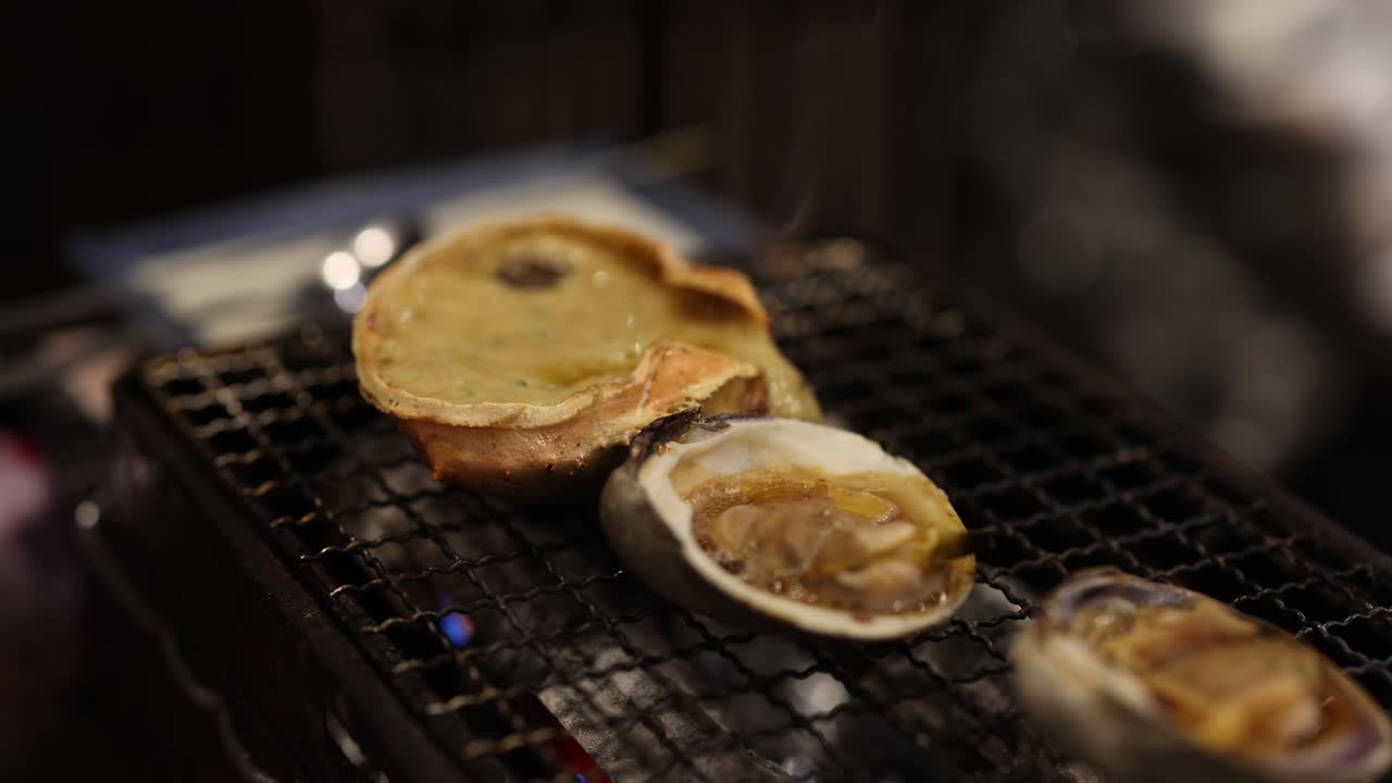 Seafood on grill with visible steam rising