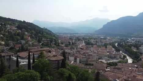 alps mountains and magical township of rovereto, aerial view