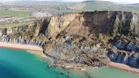 Vista-Aérea-De-La-Enorme-Caída-Del-Acantilado-De-La-Costa-Jurásica-En-Seatown-En-Dorset