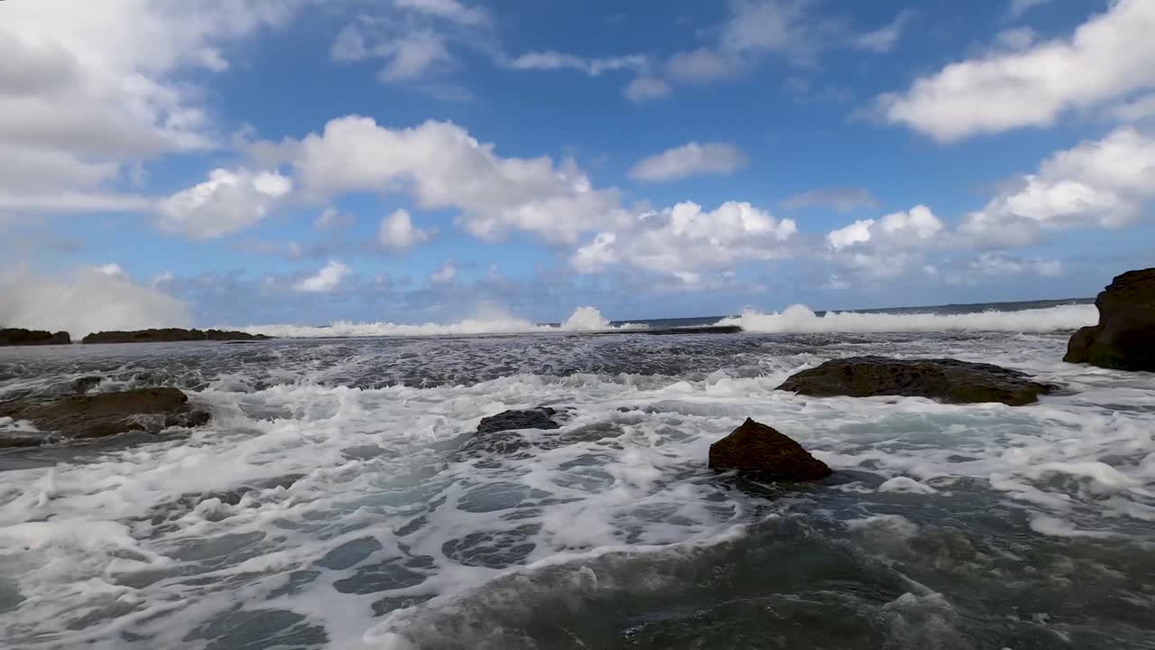 4k footage. Camera lift from underwater revealing to surface level. Location: Aguadilla, PR