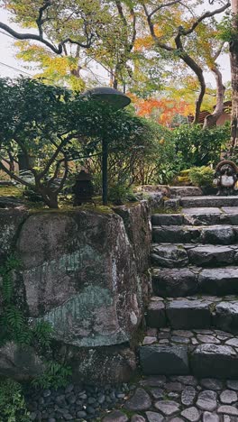 japanese garden with stone steps and autumn foliage