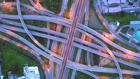 4k time lapse or hyper lapse : aerial view network or intersection of highway road for transportation or distribution concept background.