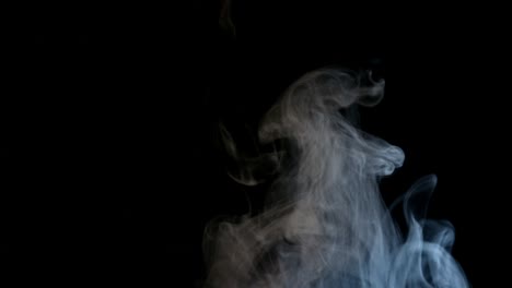 white smoke isolated on black background