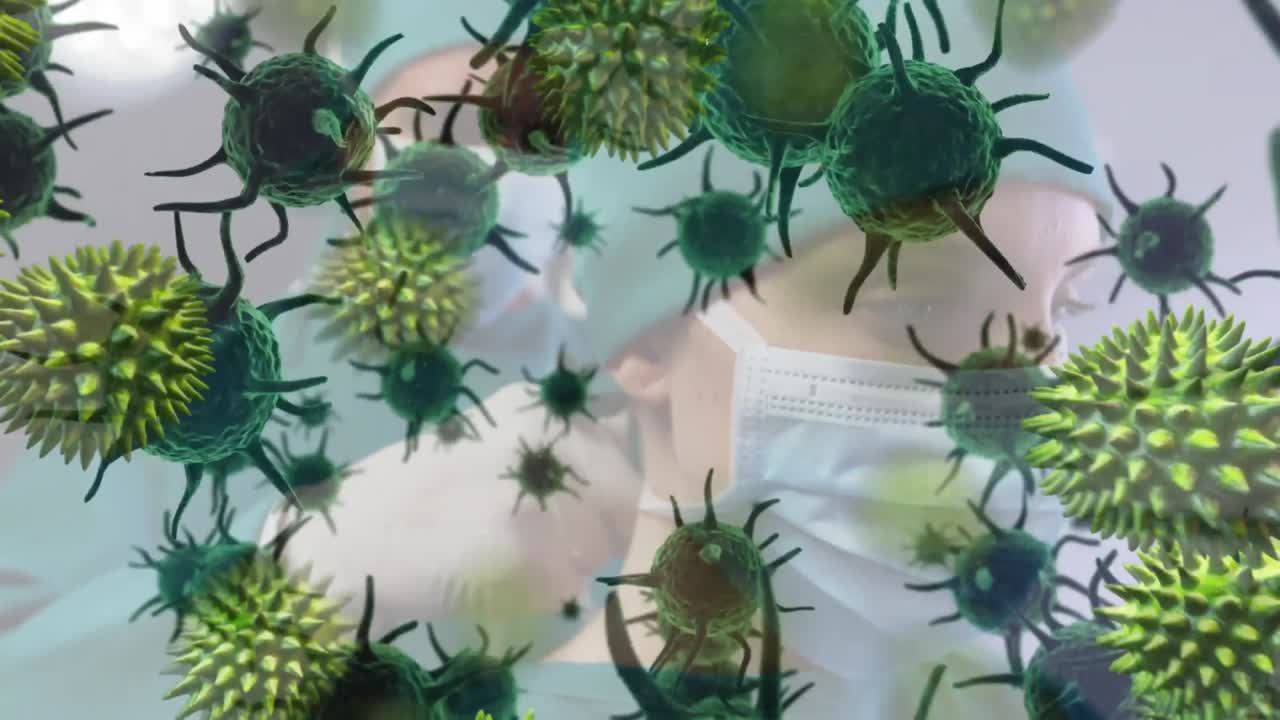 코로나바이러스 코로나19의 확산 애니메이션, 배경에는 의료진이 있습니다.