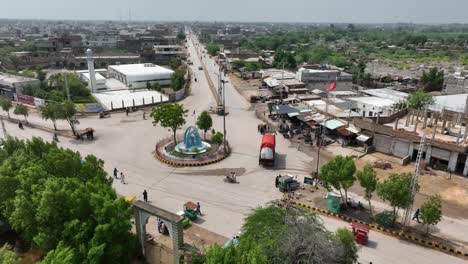 aerial roundabout badin city centre with light traffic, sindh rural pakistan