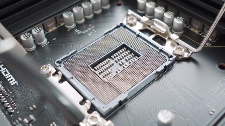 Motherboard CPU socket. Computer hardware. Close-up