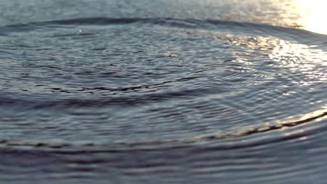 slow motion footage of splashes on water surface