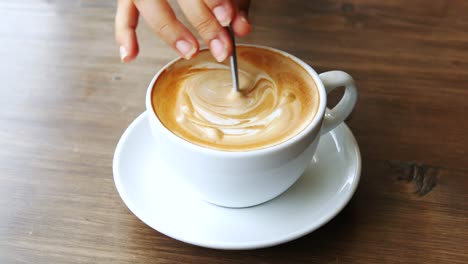 woman making latte art