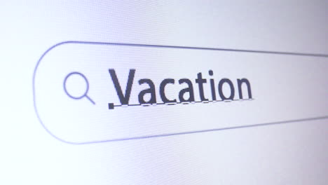 browser bar with typed vacation keyword on the computer screen, seo concept