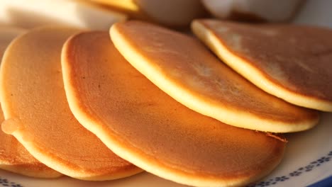 stacked pancakes on a plate