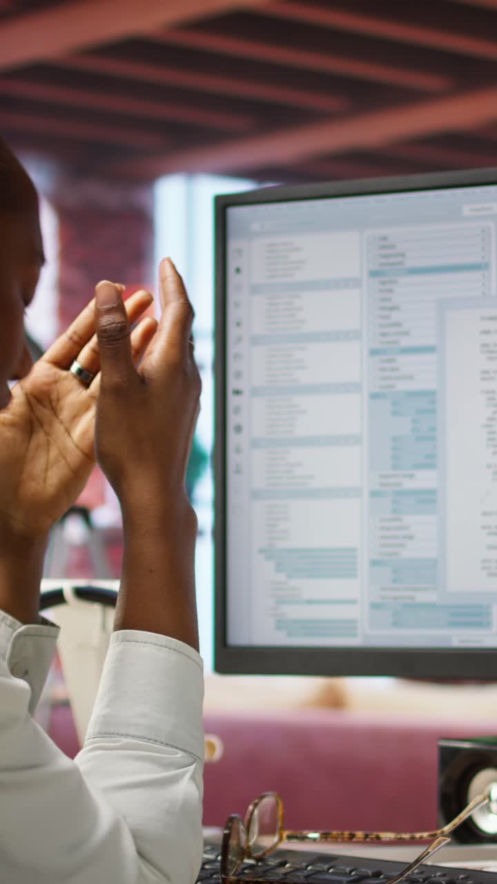 Vertical video Displeased IT worker seeing errors while using coding application