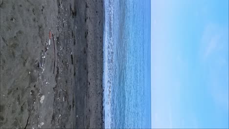 vertical view of sayangheulang beach in garut, west java, indonesia