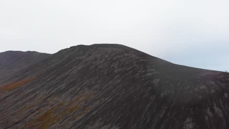 huge mountains of fagradalsfjall volcano with ashen slopes, iceland