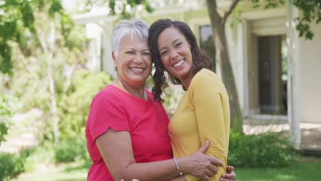 portrait of a senior african american woman and her adult daughter