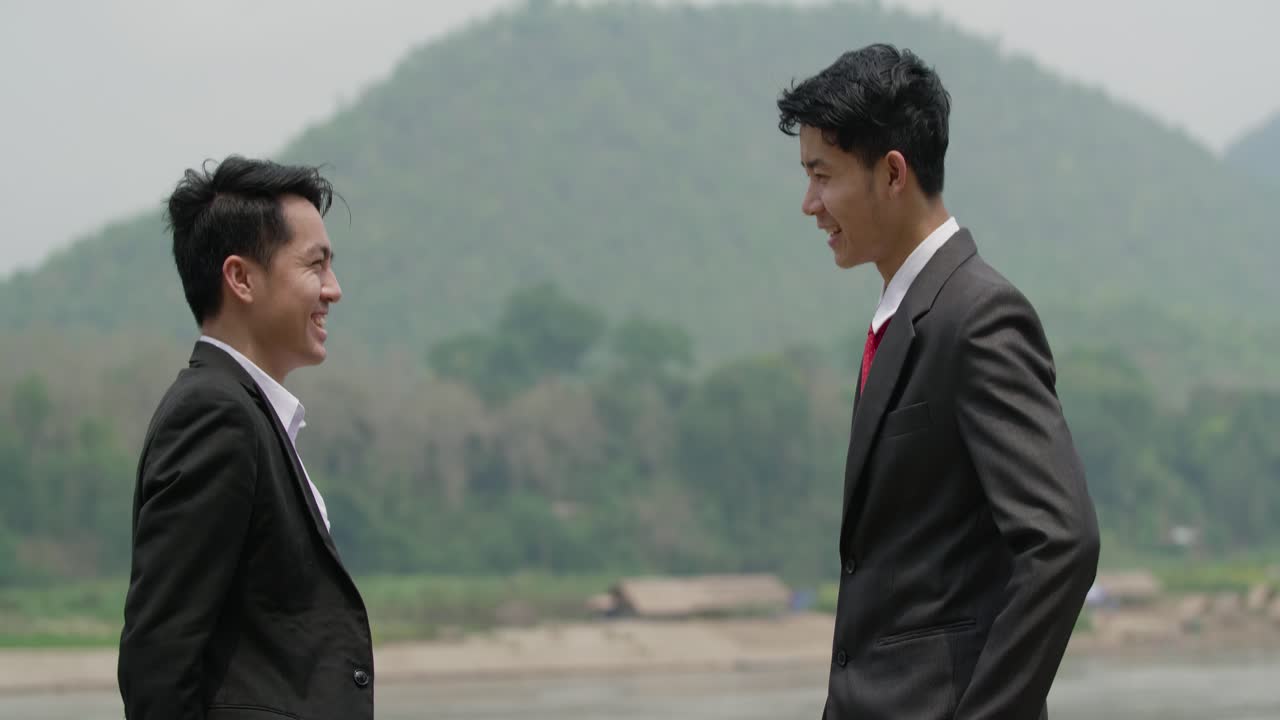 Businessmen Handshake Outdoors