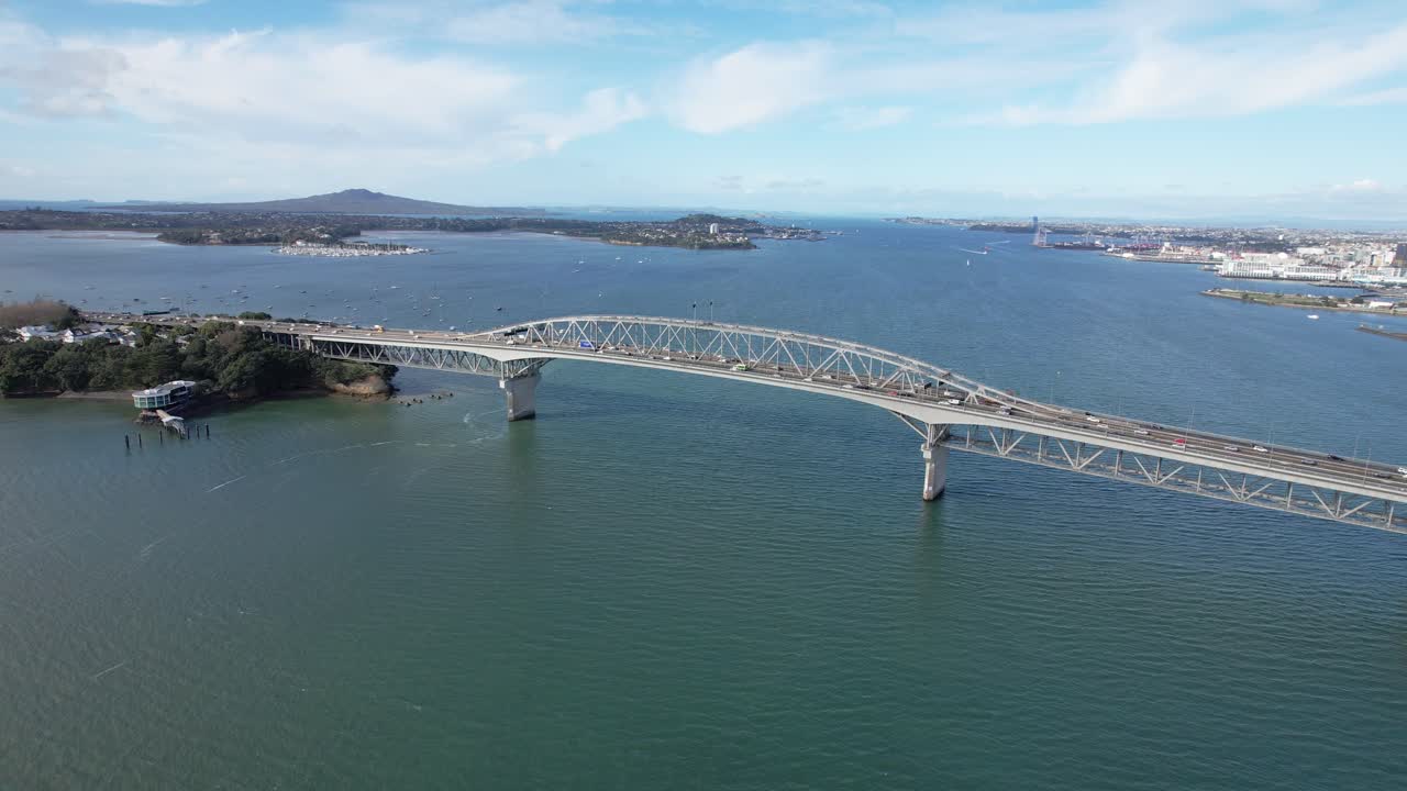 Aerial View of Auckland Harbour Bridge with City Skyline