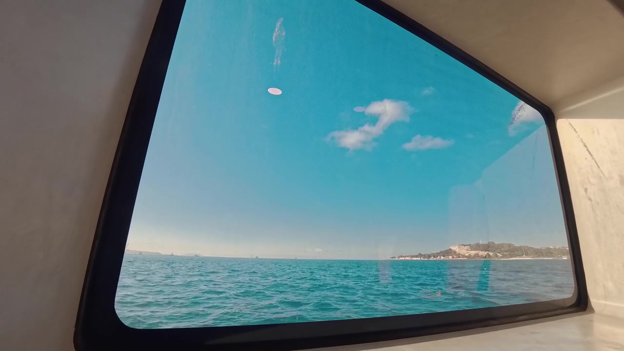 View of the Ocean from a Boat Window