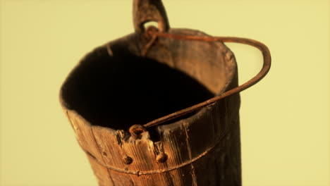 Old-used-rusted-wooden-bucket