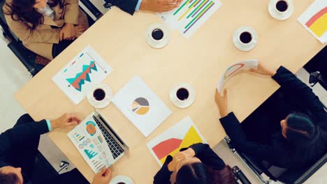 Business-people-group-meeting-shot-from-top-view